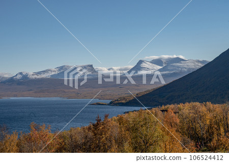 Autumn season in Abisko with Lake Tornetraesk in background, taken from Bjoerkliden, Swedish Lapland, Sweden Autumn season in Abisko with Lake Tornetraesk in background, taken from Bjoerkliden, Swedish Lapland, Sweden 106524412