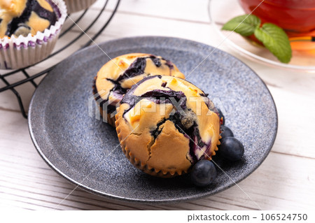 Blueberry and cream cheese muffins 106524750
