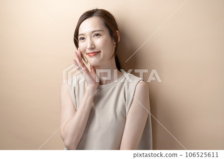 Woman touching cheek Moisturizer Woman touching cheek Moisturizer 106525611