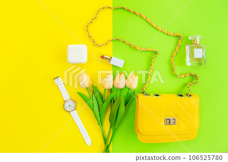Fashion stylish yellow bag and woman accessories pastel background. 106525780