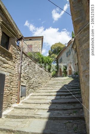 Stone steps street in Cortona, Italy. High quality photo 106525853