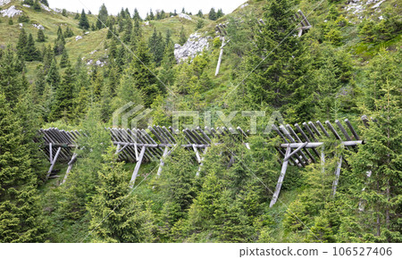 Avalanche barriers old style in Italy Avalanche barriers old style in Italy 106527406