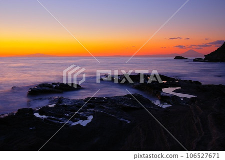 Scenery of the sea and rough seas with the silhouette of the Izu Peninsula and Mt. Fuji floating in the sky during magic hour Ver3 Scenery of the sea and rough seas with the silhouette of the Izu Peninsula and Mt. Fuji floating in the sky during magic hour Ver3 106527671