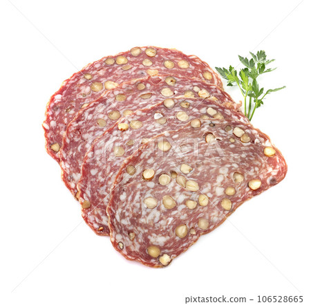 Sliced dry sausage with hazelnut 106528665