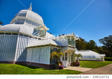 Exterior of Conservatory of Flowers building with bright sunny day and clear blue skies 106528732