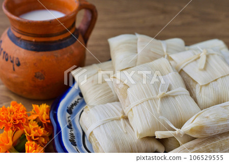 Mexican food tamales and atole, inspired by the Day of the Dead Mexican food tamales and atole, inspired by the Day of the Dead 106529555