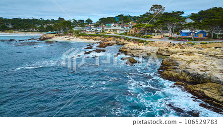 Wide aerial view of Carmel Beach with distant Clinton Walker House by Frank Lloyd Wright 106529783