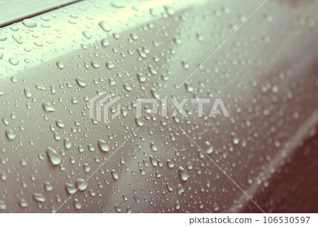 Water drops on metal. Rain drops on grey metal. Refreshing concept. Metallic pattern. Natural patterns. Wet metal surface. Water wallpaper. Clean car details. Shine and wet. 106530597