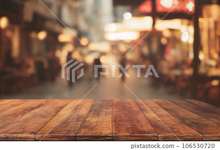 Empty wood table top on blur abstract of street restaurant outdoor night city background, for montage product display, 3d rendering Empty wood table top on blur abstract of street restaurant outdoor night city background, for montage product display, 3d rendering 106530720