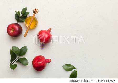 Flat lay composition with symbols jewish Rosh Hashanah holiday attributes on colored background, Rosh hashanah concept. New Year holiday Traditional. Top view with copy space Flat lay composition with symbols jewish Rosh Hashanah holiday attributes on colored background, Rosh hashanah concept. New Year holiday Traditional. Top view with copy space 106531706