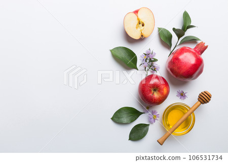 Flat lay composition with symbols jewish Rosh Hashanah holiday attributes on colored background, Rosh hashanah concept. New Year holiday Traditional. Top view with copy space 106531734