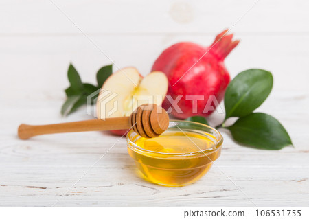 Flat lay composition with symbols jewish Rosh Hashanah holiday attributes on colored background, Rosh hashanah concept. New Year holiday Traditional. Top view with copy space Flat lay composition with symbols jewish Rosh Hashanah holiday attributes on colored background, Rosh hashanah concept. New Year holiday Traditional. Top view with copy space 106531755