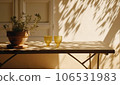 Modern still life exterior lifestyle Mediterranean in summer scene, plant potted and glasses on table with shadow overlay, generative ai 106531983