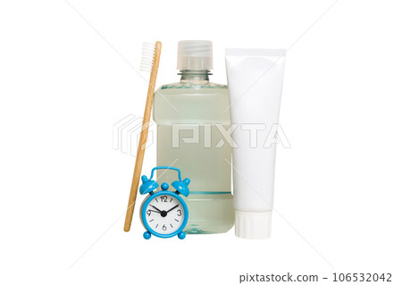 Mouthwash and other oral hygiene products on colored table top view with copy space. Flat lay. Dental hygiene. Oral care products and space for text on light background. concept 106532042