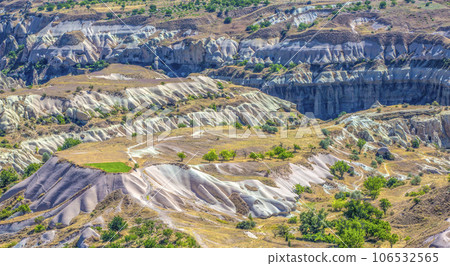 Bizarre rock formations of volcanic Tuff and basalt in Cappadocia, Turkey 106532565