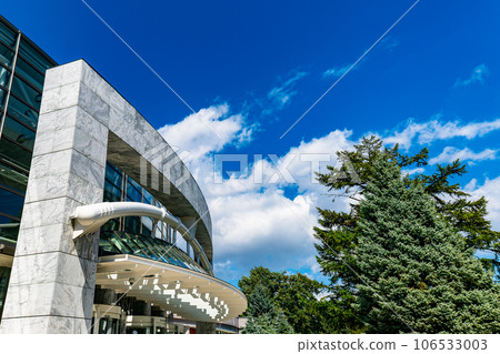 Glass building against the blue sky Glass building against the blue sky 106533003