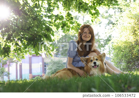 beautiful corgi dog and girl 106533472