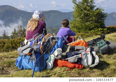 girl tourist on the background of a mountain landscape girl tourist on the background of a mountain landscape 106533477