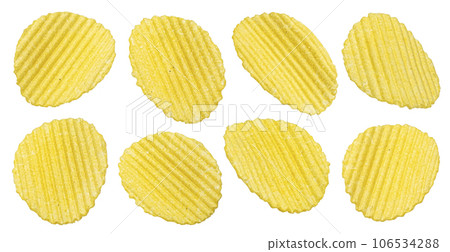 Ridged potato chips isolated on white background Ridged potato chips isolated on white background 106534288
