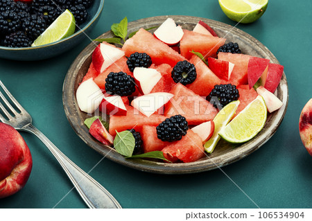 Tasty summer watermelon salad. 106534904