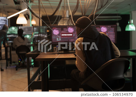 Successful cyberattack and system hacked by professional spy, hacker breaking into computer system. Man hacking server for cybercrime, online criminal stealng passwords, private information. Successful cyberattack and system hacked by professional spy, hacker breaking into computer system. Man hacking server for cybercrime, online criminal stealng passwords, private information. 106534970