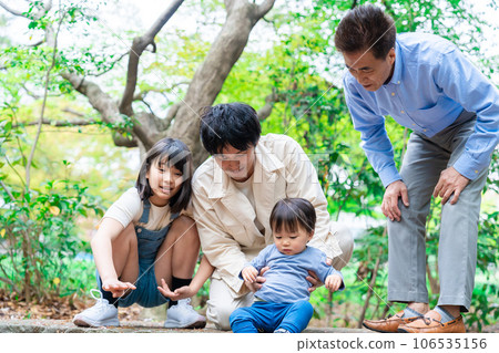 Family playing with grandpa Family playing with grandpa 106535156