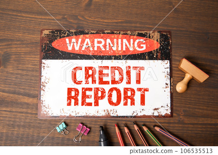 CREDIT REPORT Concept. Warning sign on wood texture background CREDIT REPORT Concept. Warning sign on wood texture background 106535513