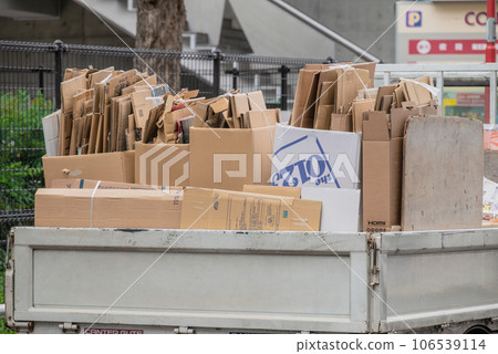 Truck loaded with business waste (cardboard) 106539114