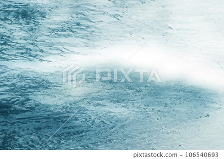 An abstract illustration style image of a blizzard blowing over a snowy field in a freezing frigid land 106540693