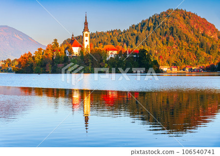 Bled, Slovenia - Sunset with Julian Alps and Church Santa Maria, beautiful Europe. Bled, Slovenia - Sunset with Julian Alps and Church Santa Maria, beautiful Europe. 106540741