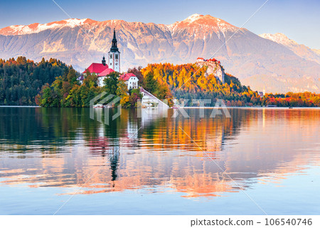 Bled, Slovenia -  Julian Alps and Church Santa Maria, beautiful autumn sunset. 106540746