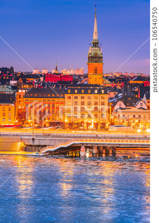 Stockholm, Sweden. Sunset over Gamla Stan and frozen Lake Malaren 106540750