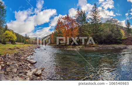 recreation place near the river. water flows through countryside valley of carpathian mountains. warm sunny weather recreation place near the river. water flows through countryside valley of carpathian mountains. warm sunny weather 106540983