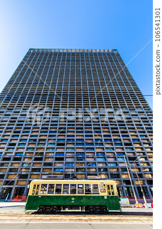 Nagasaki City Hall new building and tram [Nagasaki City] 106541301