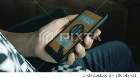 man holds his smartphone, that reads the text podcast man holds his smartphone, that reads the text podcast 106542431