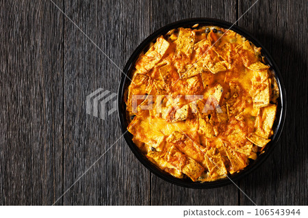 Frito chicken casserole in baking dish, top view 106543944
