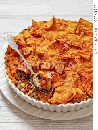 Frito chicken casserole in baking dish, top view 106543945