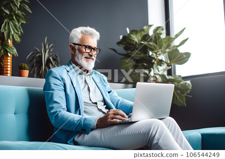 Businessman working on laptop at home. Old man using notebook. Generative Ai. 106544249