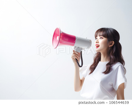 A woman with a loudspeaker A woman with a loudspeaker 106544639