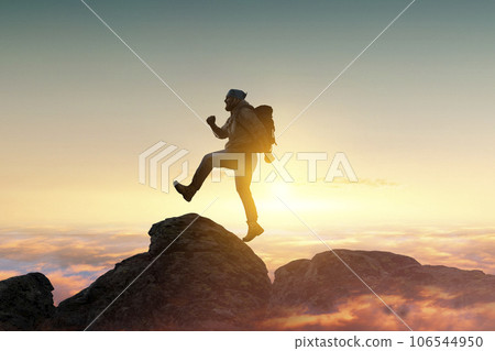 Male backpacker walking in mountains Male backpacker walking in mountains 106544950