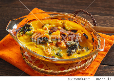 Mushroom and pumpkin gratin 106545017