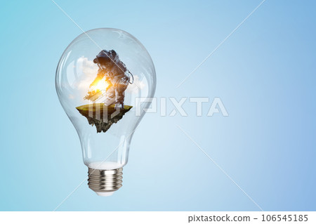 Spaceman inside light bulb . Mixed media 106545185