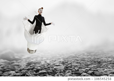 Female mime and light bulb Female mime and light bulb 106545258