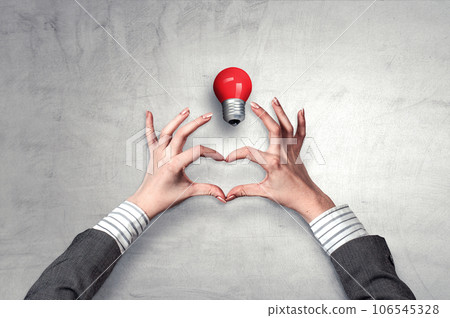 Female hands form heart shape 106545328