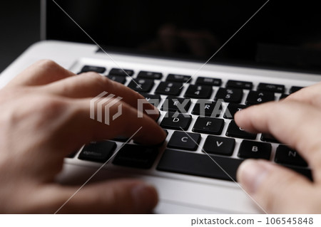 Male hand to hit the keyboard Male hand to hit the keyboard 106545848