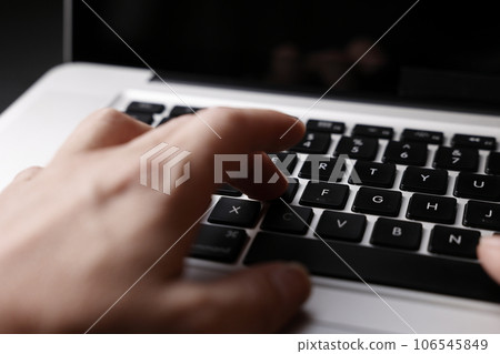 Male hand to hit the keyboard Male hand to hit the keyboard 106545849