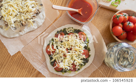 Handmade pizza at the dining table image 106545928