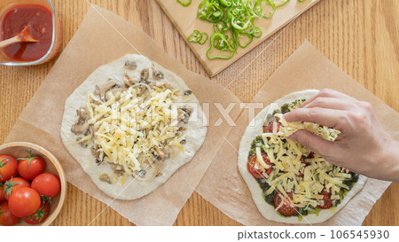 Handmade pizza at the dining table image Handmade pizza at the dining table image 106545930