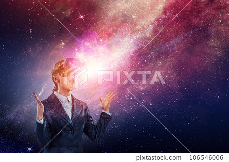 Woman wearing virtual reality goggles Woman wearing virtual reality goggles 106546006