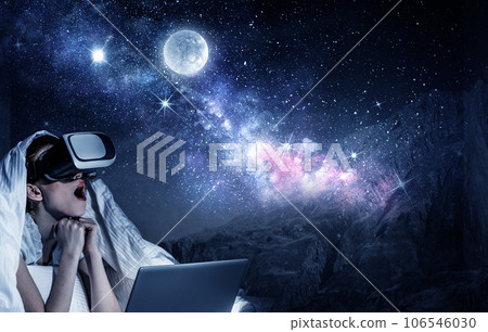 Woman wearing virtual reality goggles Woman wearing virtual reality goggles 106546030
